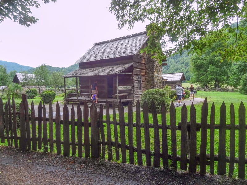 people visiting a rustic farmstead - seen on a scenic drive in the Smoky mountains