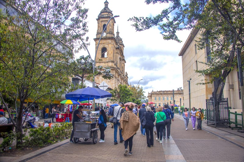 people walking along a boulevard - what to do in Bogota