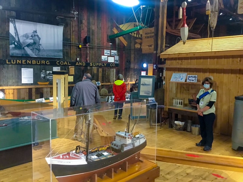 a museum with a model of a ship