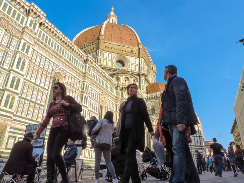 people walking past the Duomo in Florence - one of the Top 10 Places to Visit in Italy