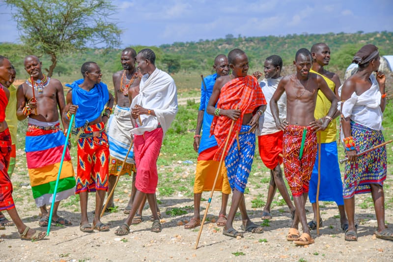 Maasai tribesmen in colorful clothing