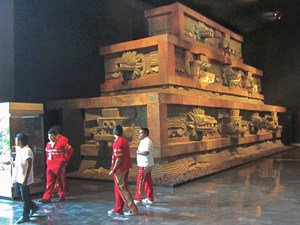 Three large tomb-like boxes in the Museum of Anthropology- one of the places to visit in Mexico City