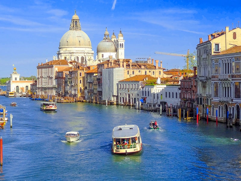 a colorful view of the Grand Canal in Venice - one of the Top 10 Places to Visit in Italy