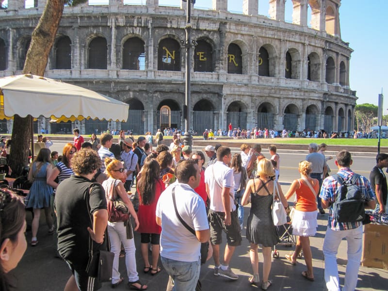 People at the coloseum in Rome - one of the Top 10 Places to Visit in Italy