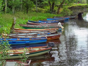 colorful boats on a creek in Killarney National Park Ireland