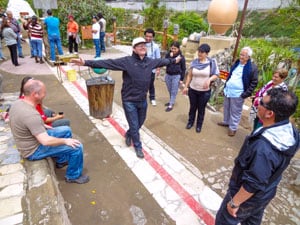 a man walking on a line on the equator in Evuador