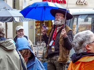 people listening to a tour guide  – one of the things to do in Bamberg, Germany