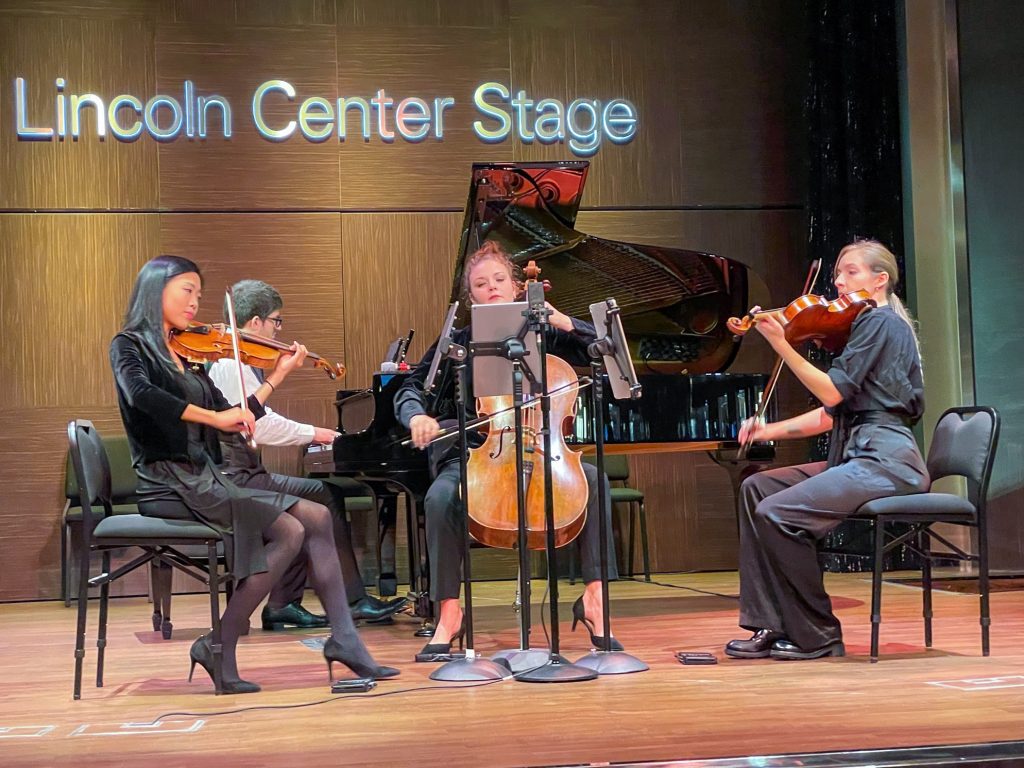 musicians on stage playing on a Rotterdam cruise