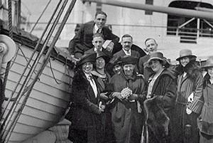 an old black and white photo of people on a Rotterdam cruise in 1929