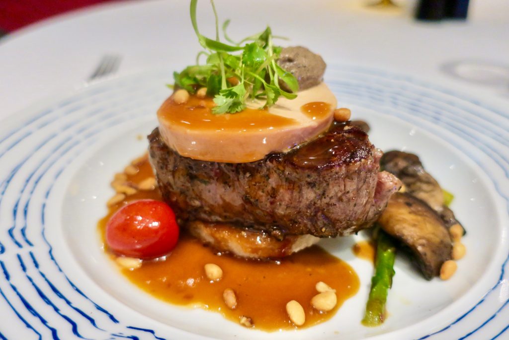 a filet of beef with foie gras at a ship's restuarant