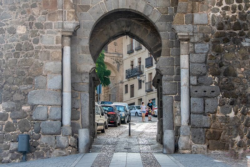 an entrance way in an ancient stone wall seen on a Toledo from Madrid day trip
