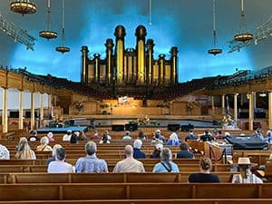 people listening to a famous pipe organ, one of the things to do in salt lake city