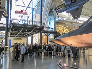 a tour group viewing an airplane