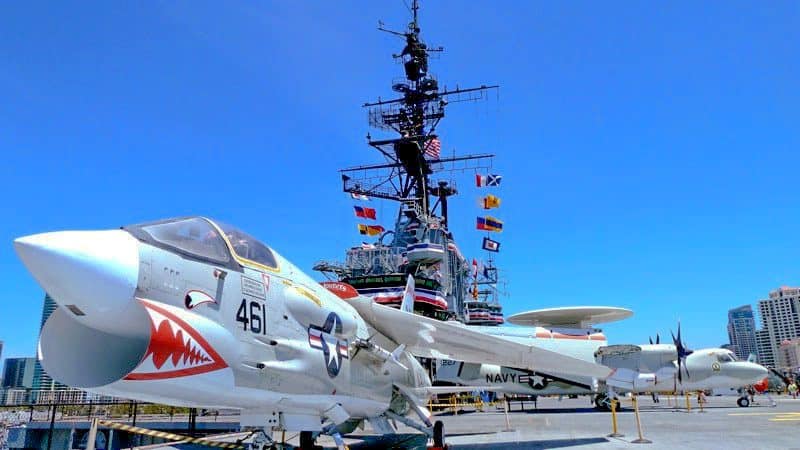 airplanes on the deck of a museum ship