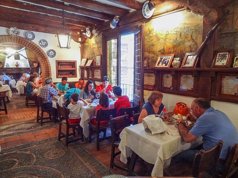 people dining in an old colorful restaurant