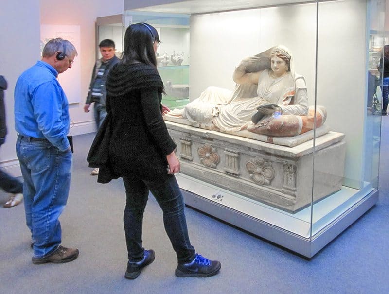 people visiting an exhibit in the British museum in the low season in Europe