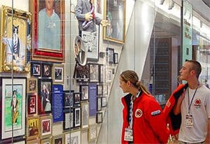 people looking at an exhibit in the presidential museum of president bill clinton