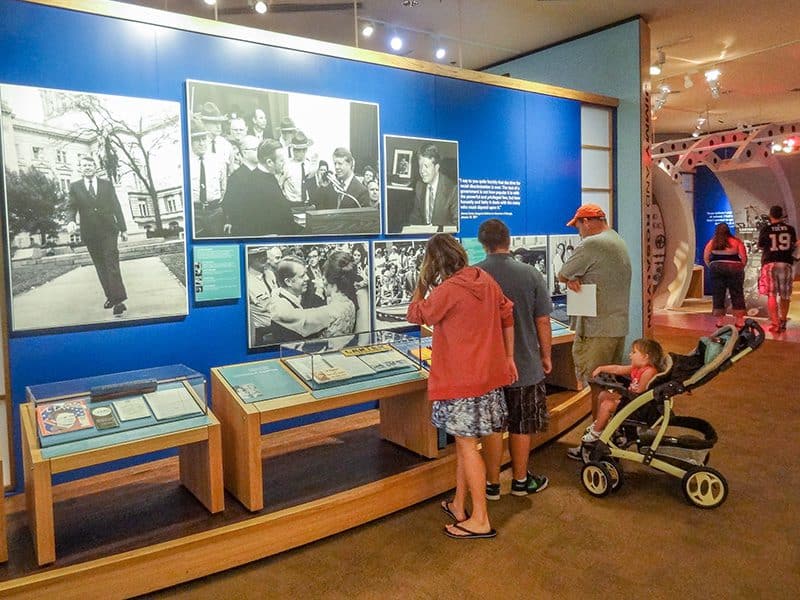 people looking at an exhibit in the presidential museum of Jimmy Varter
