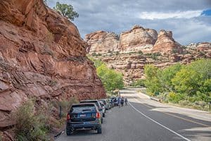 cars parked along a mountain road