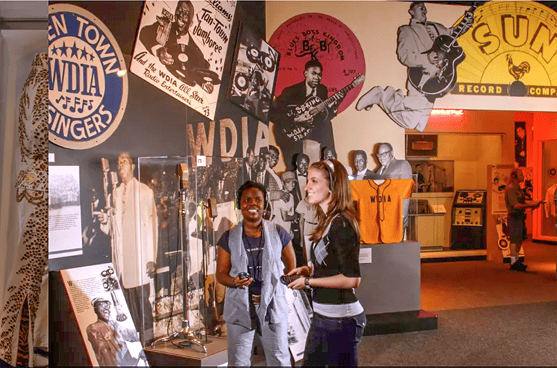 two women in a rock 'n roll museum