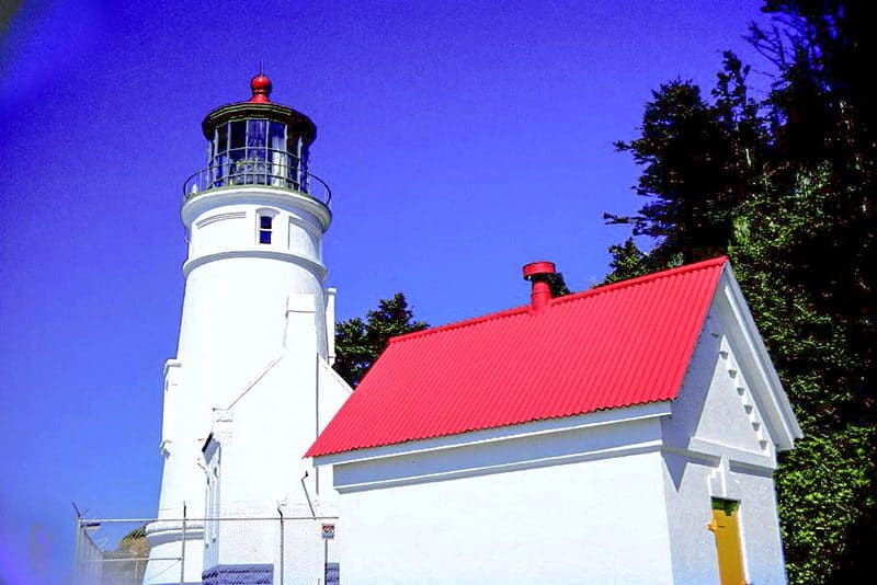 a white building with a red roof