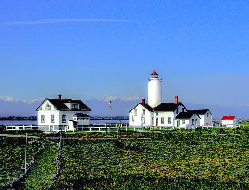 rural buildings with mountains in the distance