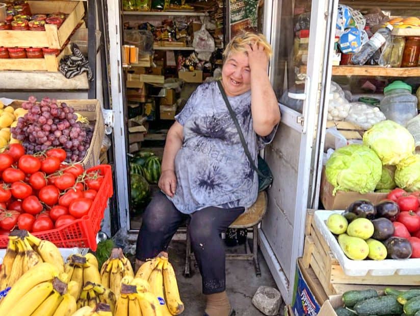 a woman selling vegetables