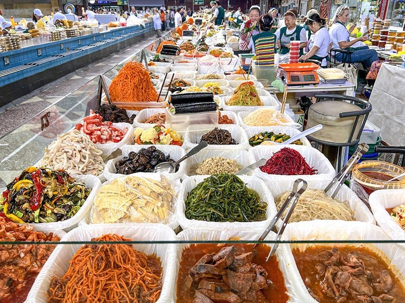 foods in bins in a large market, seen on a visit to almaty kazakhstan