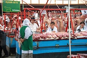 butchers sitting at a counter, seen on a visit to almaty kazakhstan