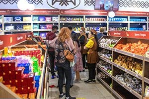 women in a candy store, seen on a visit to almaty kazakhstan