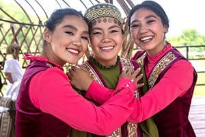 3 young women hugging each other