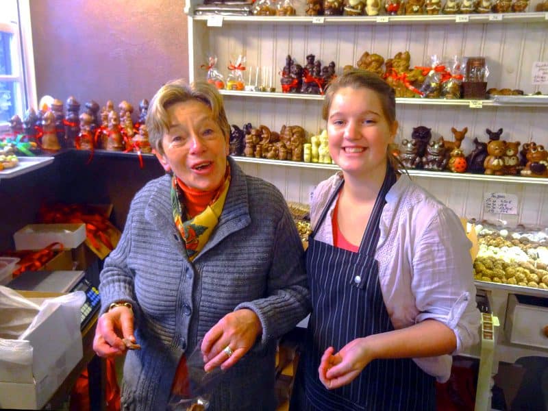 two women in a shop seen on a search for chocolate in Bruges