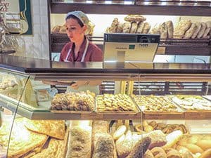 a woman in a bakery