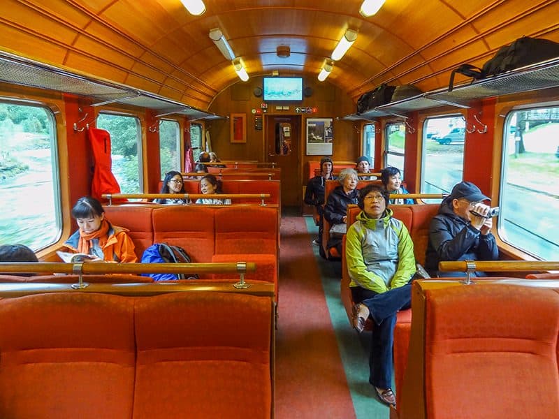 passengers inside a car on the Flam Railway