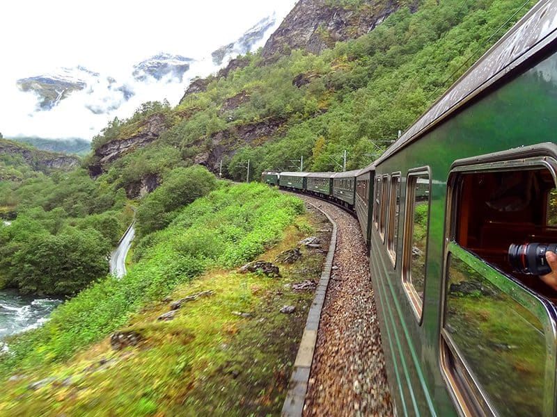 the Flam railway traveling through a mountain pass