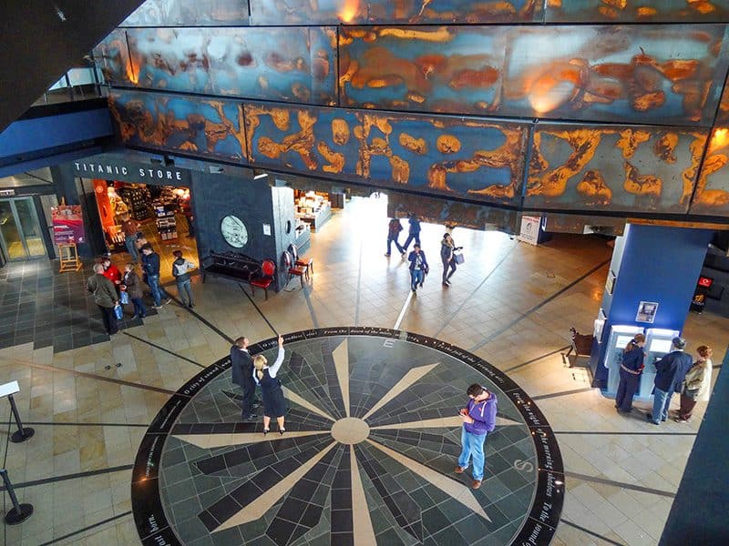 people standing in the atrium of the Titanic Museum Belfast