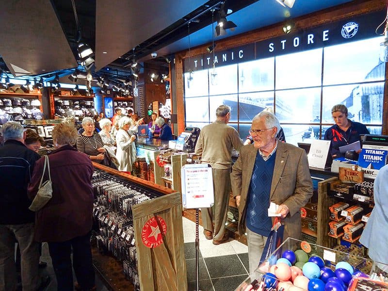 people walking about the Titanic Museum Belfast gift shop