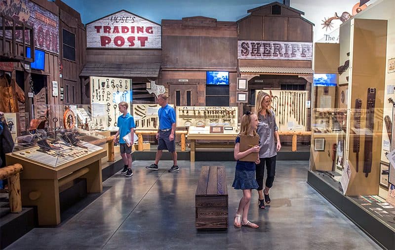 a family in an Old West museum exhibit in Scottsdale Arizona