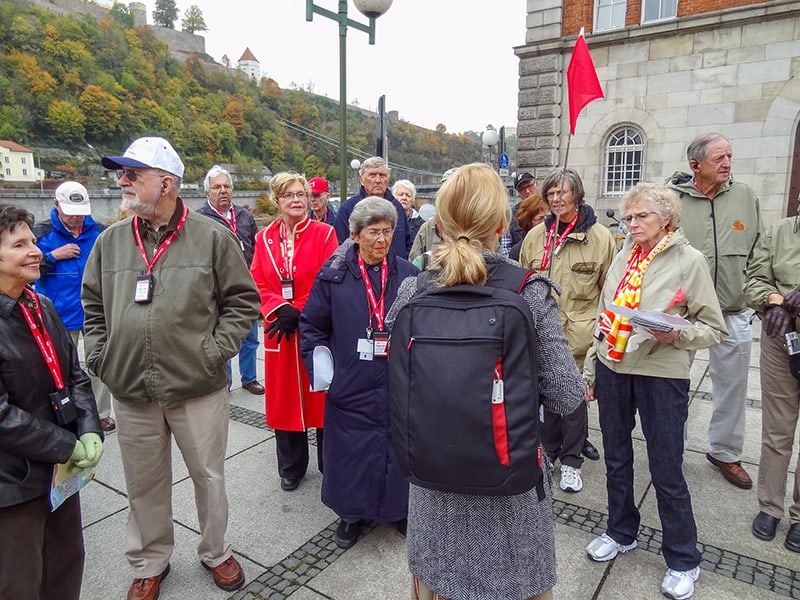 a guide talking to a tour group