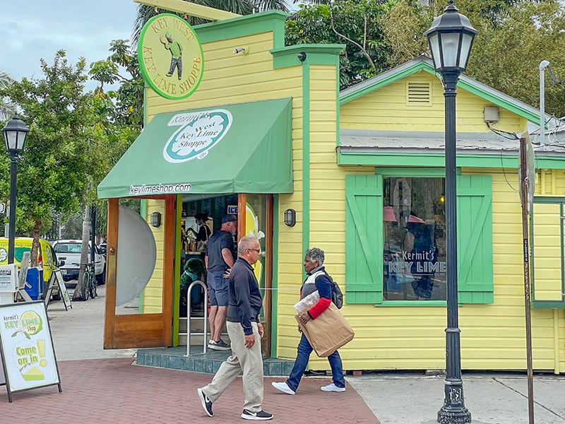a quaint yellow and green store front