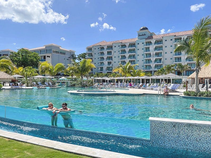 people in a swimming pool at Sandals Dunns River Resort