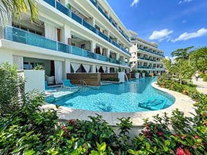 pools alongside a building at a resort