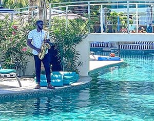 man playing a saxophone at Sandals Dunns River Resort