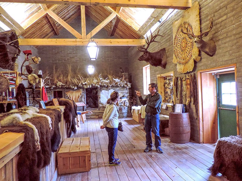 woman and man talking in a trade store in Fort Benton MT