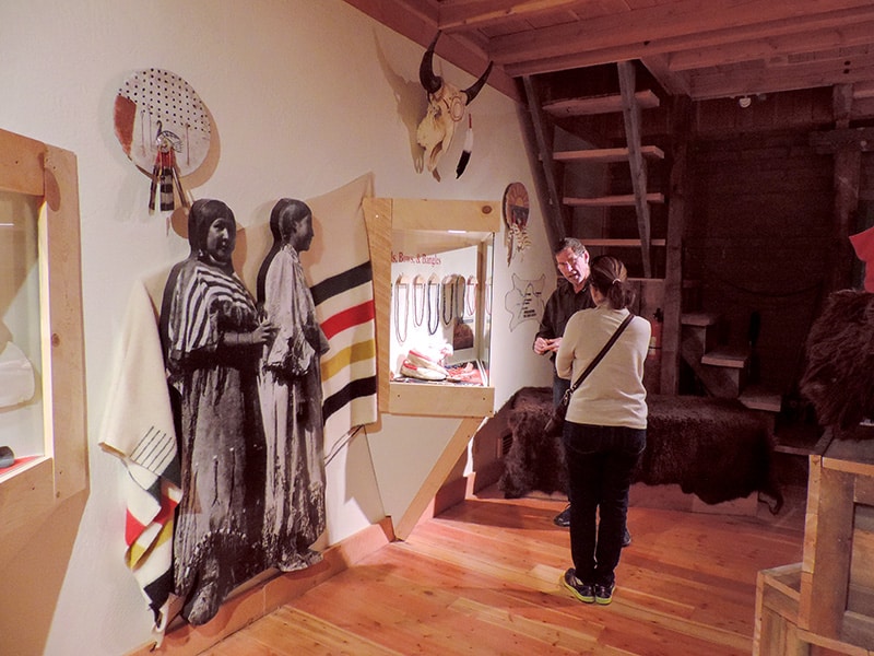 woman and man talking at a museum exhibit in Fort Benton MT