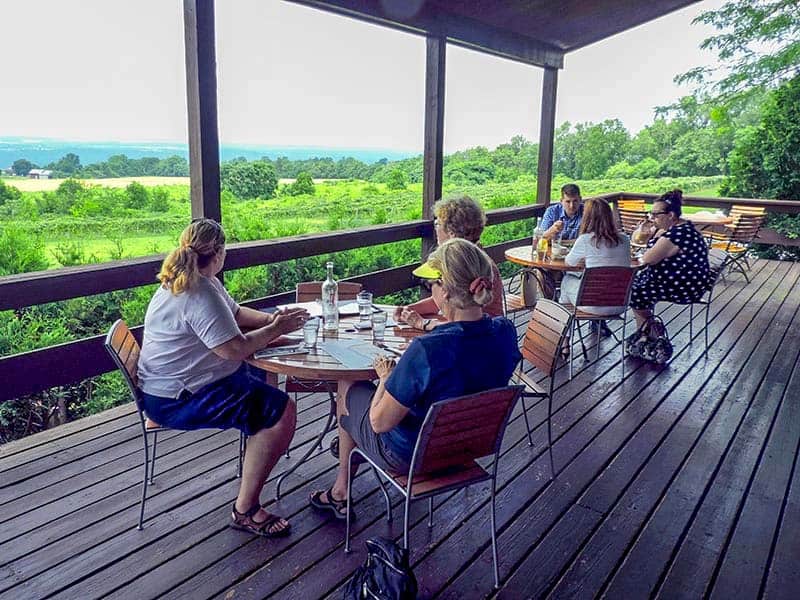 people having a meal in an outdoor restuarant