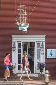 a large model ship on a building wall –nantucket vs marthas vineyard