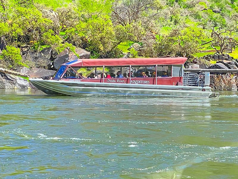 people in a jet boat during American Cruise Lines Lewis and Clark tour