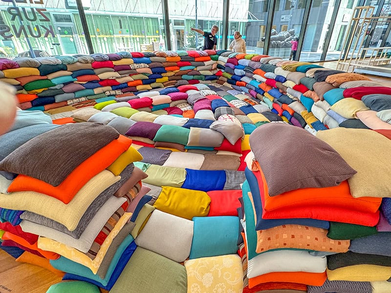 an art exhibit of colorful sand bags in Liechtenstein