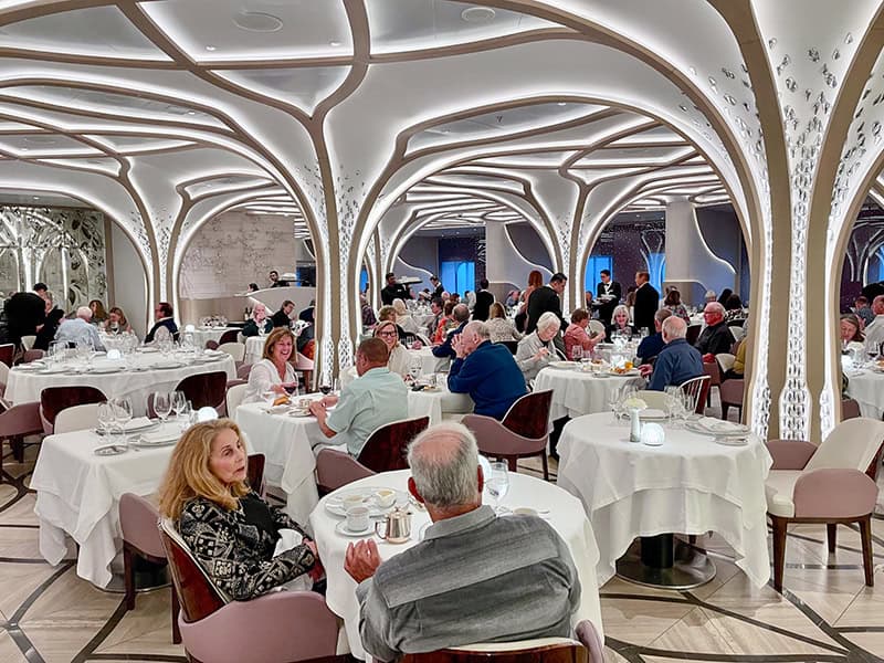 people dining in a modernistic restaurant aboard the Regent Seven Seas Grandeur